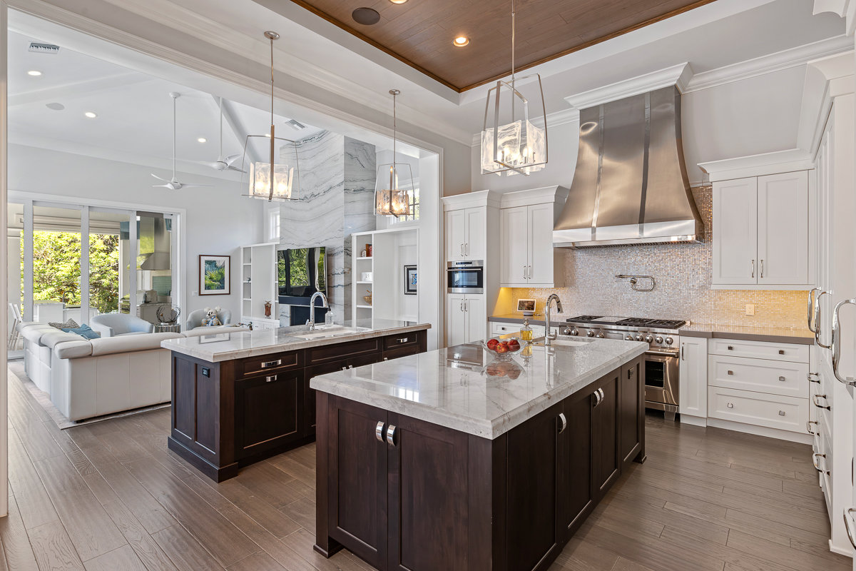 kitchen with marble wood island and stainless steel appliances